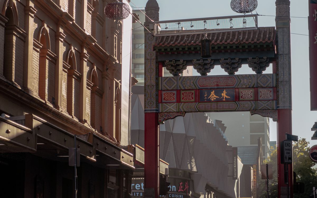 Traditional gateway and surrounding shopfronts in Sydney Chinatown